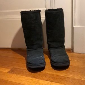 Tall black Ugg boots.